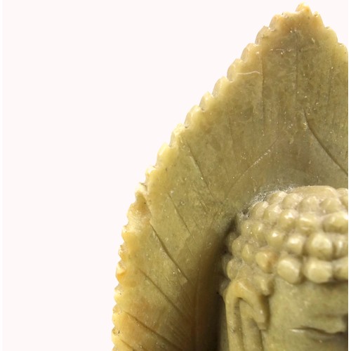 692 - Chinese carved pale green stone figure of Guanyin, seated in Vajrasana on a double lotus throne with... 