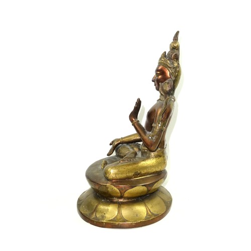 693 - 19th Century Tibetan bronze figure of Tara Buddha, seated in Vajrasana on a double lotus base, her r... 