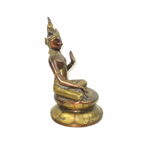 693 - 19th Century Tibetan bronze figure of Tara Buddha, seated in Vajrasana on a double lotus base, her r... 