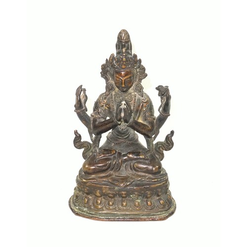 695 - 18th Century Tibetan bronze figure of the bodhisattva Chaturbhuja Lokesvara, seated in Vajrasana on ... 