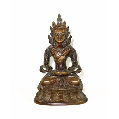 696 - 18th Century Tibetan bronze figure of Avalokiteshvara, seated in Vajrasana on a double lotus throne,... 