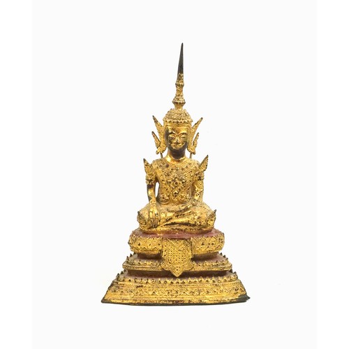 697 - 18th Century Thai gilt bronze figure of a buddha, seated in Vajrasana on a stepped lotus base with r... 