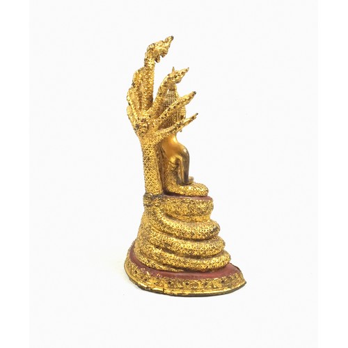 698 - 18th Century Thai gilt bronze figure of Buddha, seated in Vajrasana on a lotus throne supported by M... 