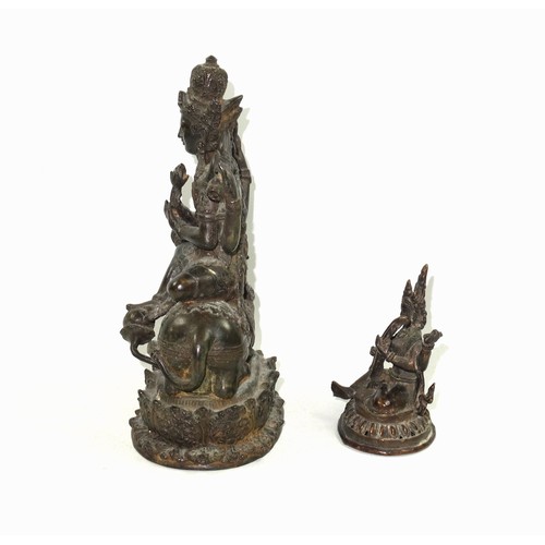 703 - 19th Century Indian bronze figure of Umiya, seated in Lalitasana with her right foot on a lotus flow... 