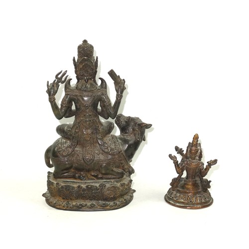 703 - 19th Century Indian bronze figure of Umiya, seated in Lalitasana with her right foot on a lotus flow... 