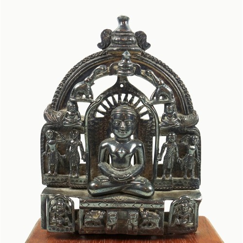 704 - Indian Silver Jain shrine, with a Tirthankara seated on a throne supported by monkeys and elephants,... 