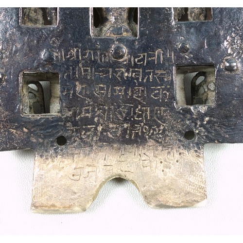 704 - Indian Silver Jain shrine, with a Tirthankara seated on a throne supported by monkeys and elephants,... 