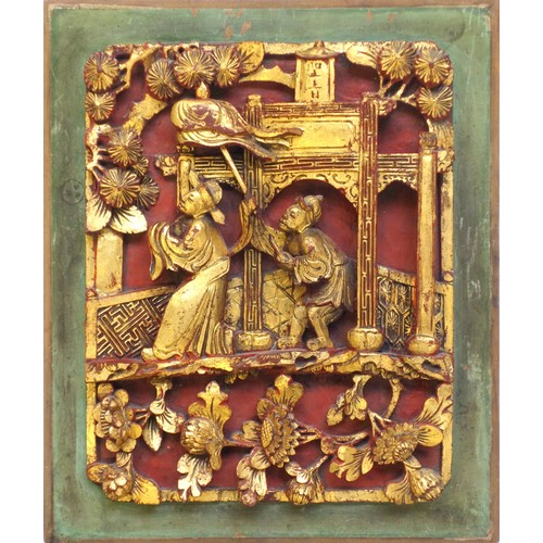 707 - A Chinese carved wood gilt panel, 19th or 20th century, depicting imperial court figures, 33 x 28cm,... 