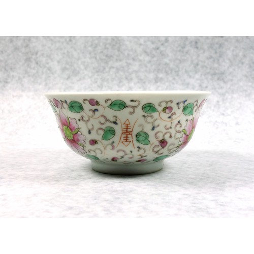 709 - Chinese porcelain bowl with a flared rim and decorated in polychrome enamels with lotus flowers, scr... 