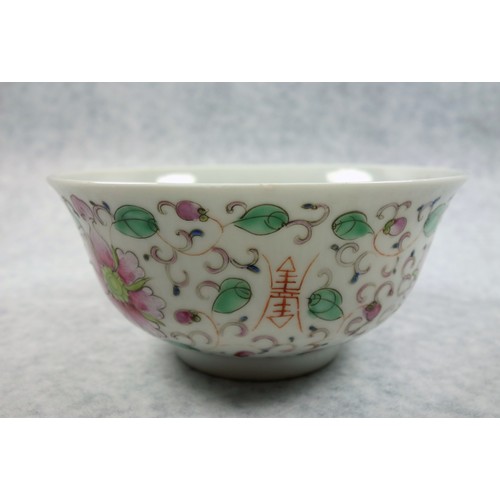 709 - Chinese porcelain bowl with a flared rim and decorated in polychrome enamels with lotus flowers, scr... 