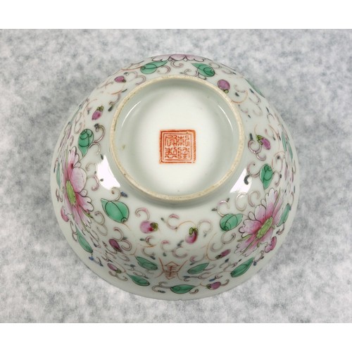 709 - Chinese porcelain bowl with a flared rim and decorated in polychrome enamels with lotus flowers, scr... 