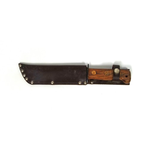 716 - A British Army survival knife 1984, in a sheath dated 1988, blade length 18.2cm, serial number 12782... 