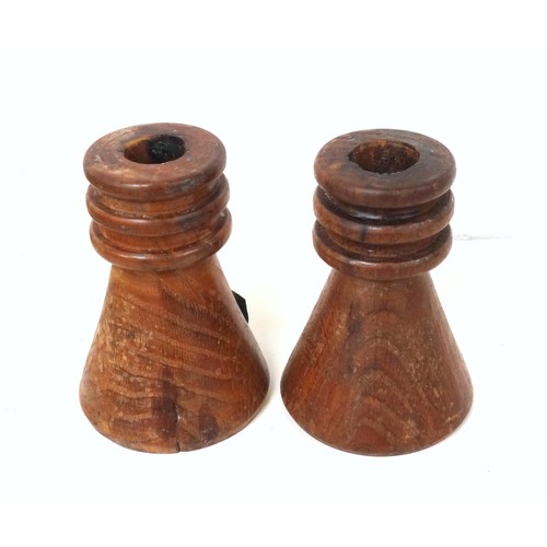 718 - Pair of turned tapering candlesticks, each with a plaque inscribed 