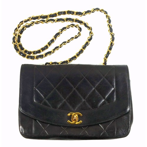 734 - Chanel Diana handbag, c.1995, the black quilted lambskin body with gilt logo turn-lock fastening, in... 