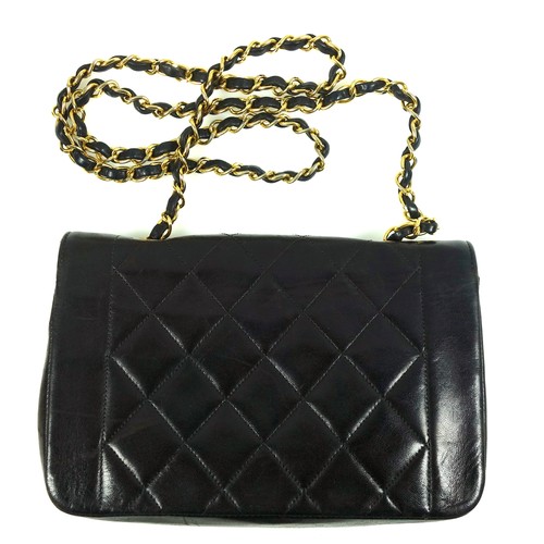 734 - Chanel Diana handbag, c.1995, the black quilted lambskin body with gilt logo turn-lock fastening, in... 