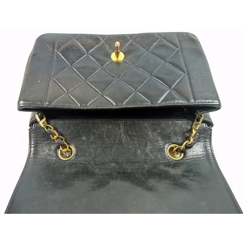 734 - Chanel Diana handbag, c.1995, the black quilted lambskin body with gilt logo turn-lock fastening, in... 