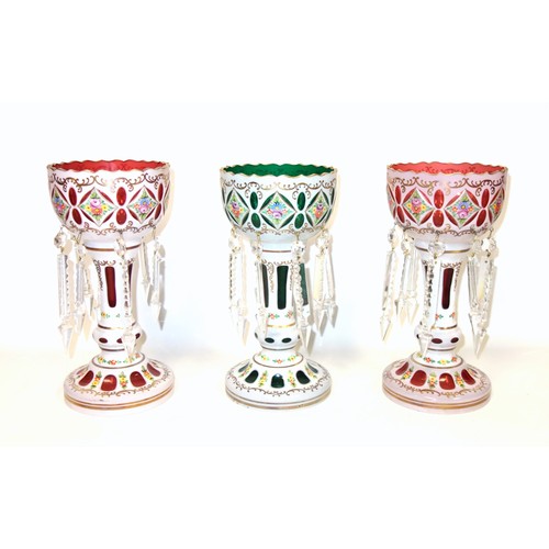 852 - Pair of late 19th Century Bohemian white overlay cranberry glass lustres with floral and gilt decora... 