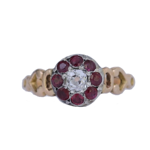 10 - ANTIQUE RUBY AND DIAMOND CLUSTER RING, set with a central diamond of approx. 0.20 ct. surrounded by ... 