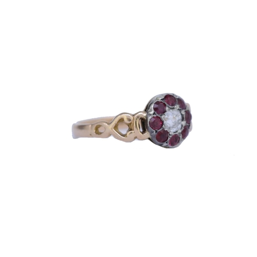 10 - ANTIQUE RUBY AND DIAMOND CLUSTER RING, set with a central diamond of approx. 0.20 ct. surrounded by ... 