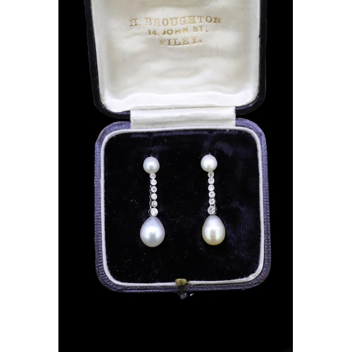 20 - IMPORTANT PAIR OF NATURAL PEARL AN DIAMOND DROP EARRINGS, set with a pearl top, suspending a 6 diamo... 