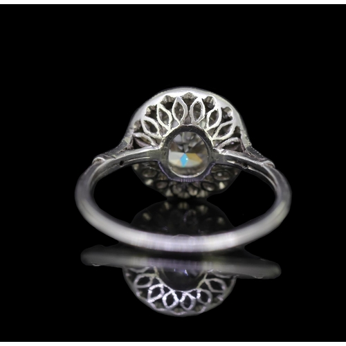 22 - DIAMOND CLUSTER RING, set with a central diamond of approx. 1.32 ct. surrounded by diamonds and diam... 