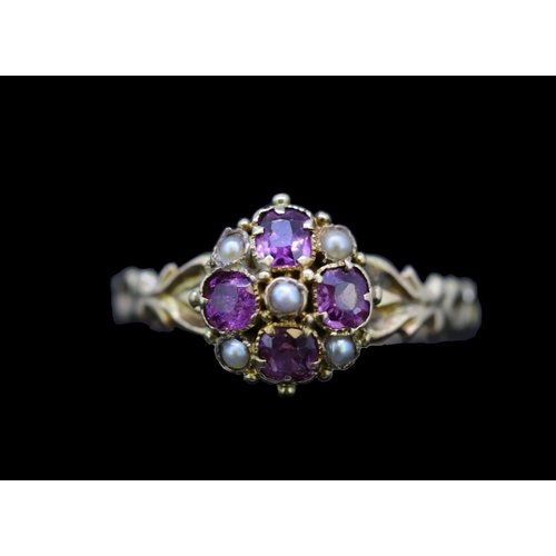 41 - ANTIQUE GARNET AND PEARL RING, set with 4 garnets and 5 seedpearls. Part openwork shank. Size O. 1.6... 