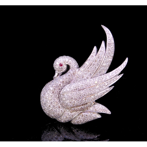 43 - DIAMOND AND RUBY SWAN BROOCH, set throughout with diamonds totalling approx. 4.25 ct. and a ruby acc... 