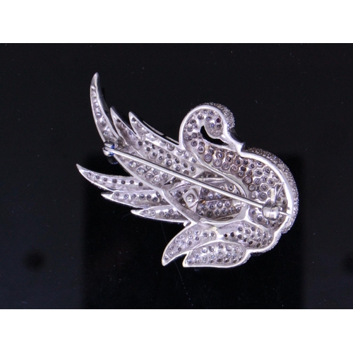 43 - DIAMOND AND RUBY SWAN BROOCH, set throughout with diamonds totalling approx. 4.25 ct. and a ruby acc... 