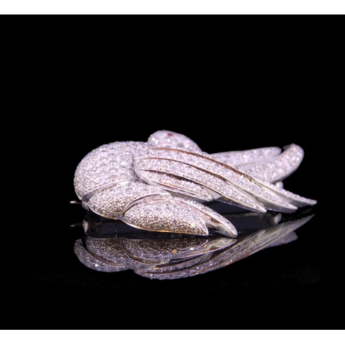 43 - DIAMOND AND RUBY SWAN BROOCH, set throughout with diamonds totalling approx. 4.25 ct. and a ruby acc... 