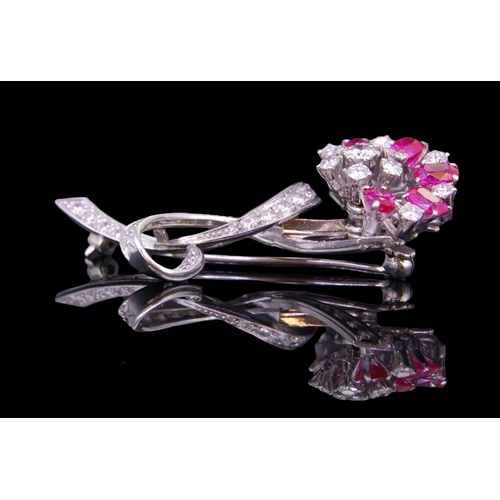 48 - RUBY AND DIAMOND FLORAL BROOCH, set with 5 rubies totalling approx. 2.50 ct. and diamonds totalling ... 