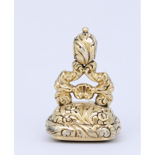 52 - ANTIQUE FOB SEAL, decorated with relief floral and scrolling design, set with a carved intaglio depi... 