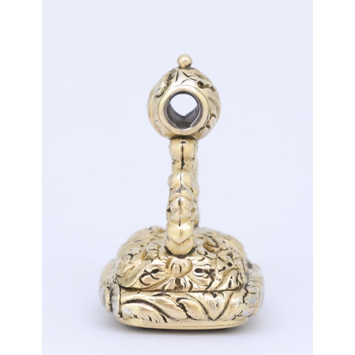 52 - ANTIQUE FOB SEAL, decorated with relief floral and scrolling design, set with a carved intaglio depi... 