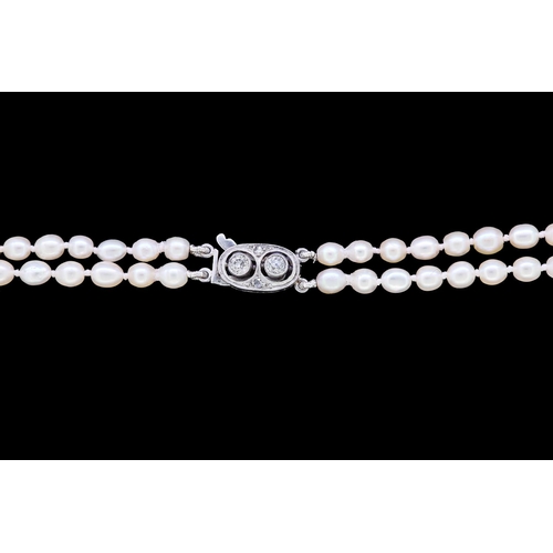 32 - IMPORTANT CERTIFICATED NATURAL SALTWATER PEARL DOUBLE ROW NECKLACE, set with 177 graduated pearls, a... 