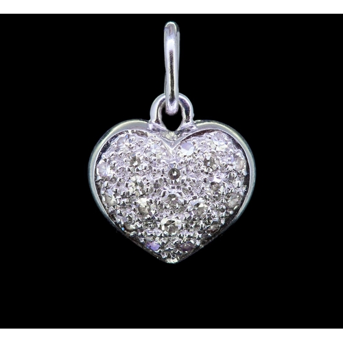 5 - DIAMOND HEART PENDANT, set with diamonds totalling approx. 0.50 ct. L. 1.5 cm. 2.5 grams.