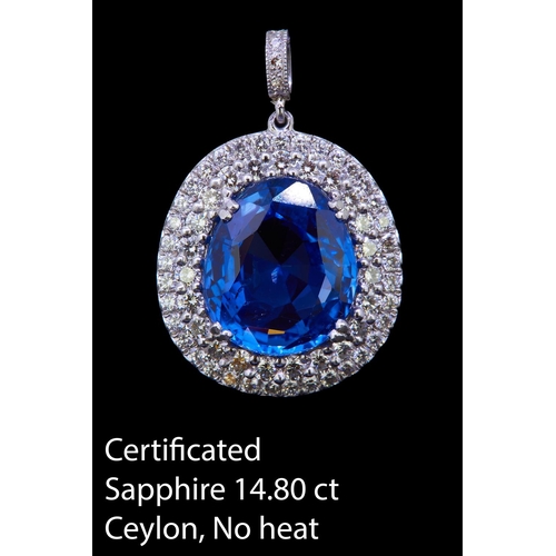 51 - IMPORTANT 14.80 CTL CEYLON NO HEAT BLUE SAPPHIRE AND DIAMOND PENDANT, set to the center with a 14.80... 