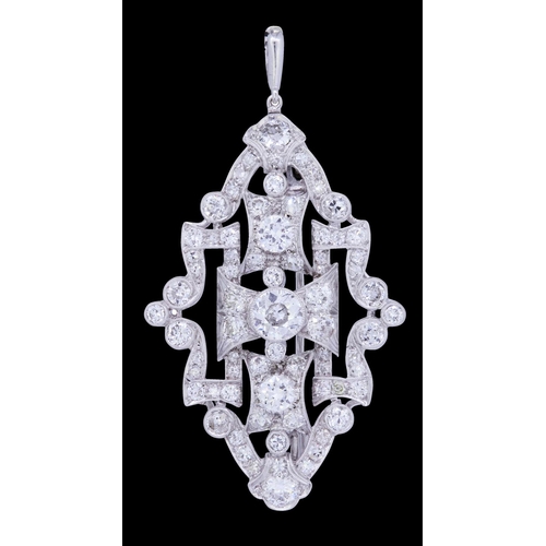 52 - IMPORTANT DIAMOND BROOCH/PENDANT, in precious white metal. Of part openwork design, throughout set w... 