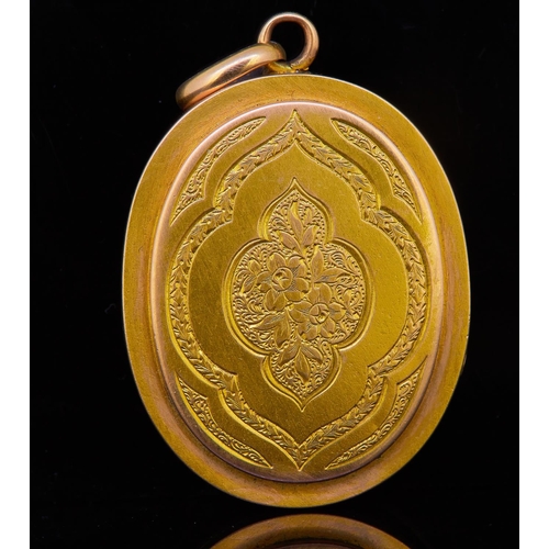 8 - ANTIQUE VICTORIAN LOCKET PENDANT, decorated to the front and back with scrolling and floral engravin... 