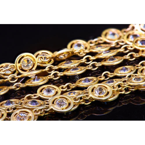 34 - PASTE SAUTOIRE LINK NECKLACE, the round links each set with a white paste stone. L. 155 cm. 29.5 gra... 