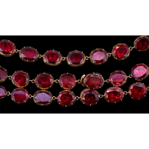 59 - ANTIQUE GEORGIAN GARNET NECKLACE, the links set with foiled back garnets. The necklace has 2 clasps ... 