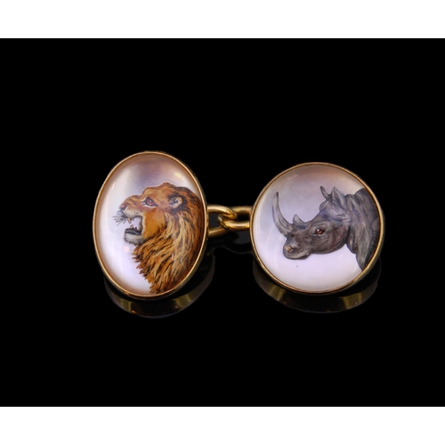 147 - DEAKIN & FRANCIS, A PAIR OF REVERSE INTAGLIO LION AND RHINO CUFFLINKS, in 18ct yellow gold, each for... 