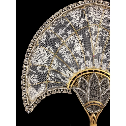 234 - IMPORTANT GEM SET HAND FAN, 18 ct yellow gold frame, the handle of openwork floral design, sprouting... 