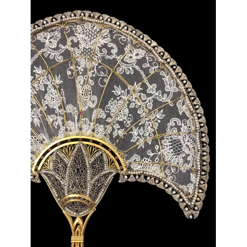 234 - IMPORTANT GEM SET HAND FAN, 18 ct yellow gold frame, the handle of openwork floral design, sprouting... 