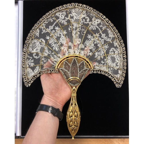 234 - IMPORTANT GEM SET HAND FAN, 18 ct yellow gold frame, the handle of openwork floral design, sprouting... 