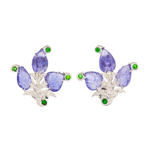 270 - PAIR OF FLORAL TANZANITE AND DIAMOND EARRINGS, in precious white metal. Each set with 3 carved tanza... 