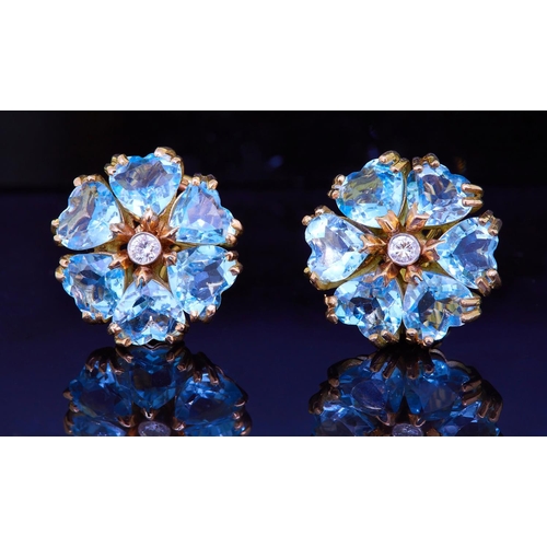 272 - PAIR OF AQUAMARINE AND DIAMOND FLORAL EARRINGS, set to the center with a diamond, totalling approx. ... 