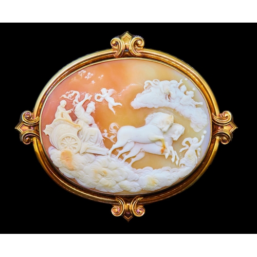 274 - LARGE SHELL CAMEO BROOCH, with a carved scene depicting a charriot with person pulled by 2 horses on... 