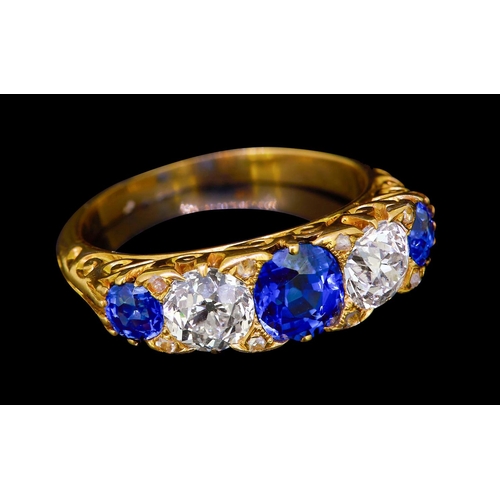 277 - SAPPHIE AND DIAMOND 5-STONE RING, set with 3 blue sapphires totalling approx. 1.35 ct. Flanked with ... 