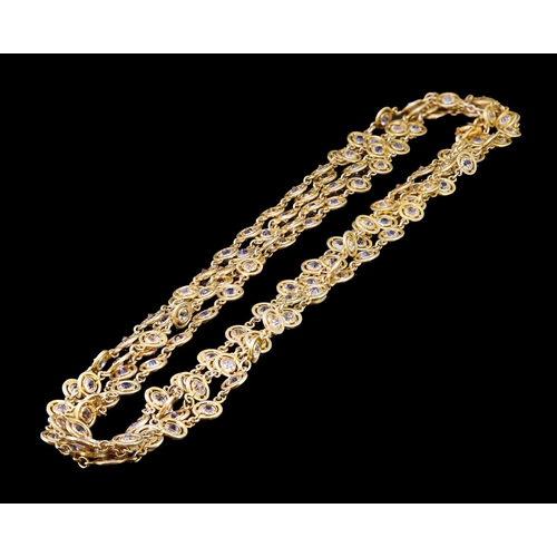 304 - PASTE SAUTOIRE LINK NECKLACE, the round links each set with a white paste stone. L. 155 cm. 29.5 gra... 