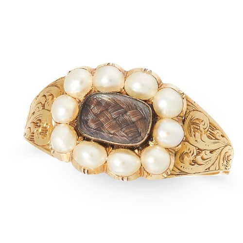 342 - ANTIQUE PEARL MEMORI RING, set to the center with a locket with hair, surrounded by a pearl border. ... 