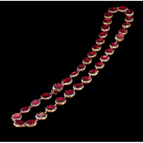 67 - ANTIQUE GEORGIAN GARNET NECKLACE, the links set with foiled back garnets. The necklace has 2 clasps ... 